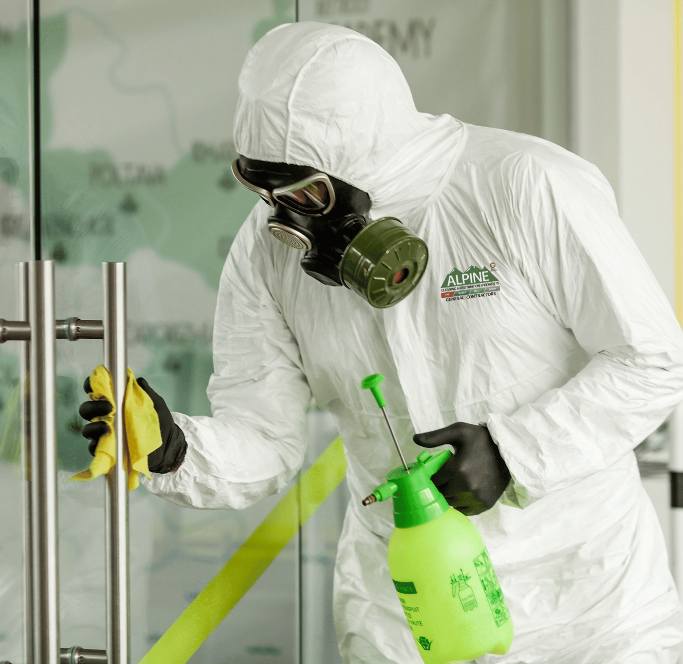 Alpine Cleaning team disinfecting an office